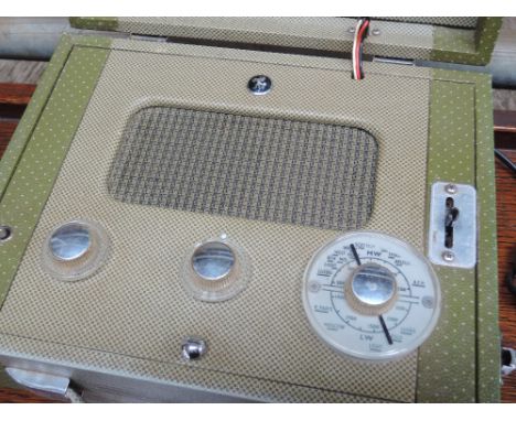 A vintage radio in carry case