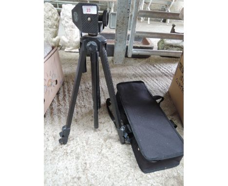A camera tripod and case