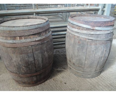 A pair of vintage wooden barrels