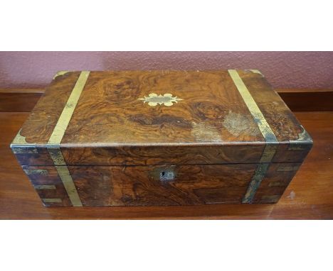 A Victorian Walnut and Brass Bound Lap Desk, With presentation plaque to the top, enclosing a leather tooled interior, also w