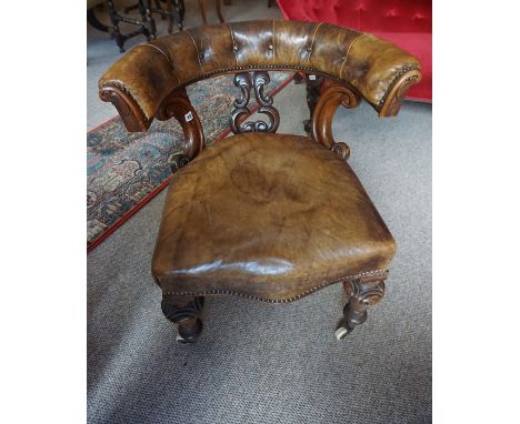 A Victorian Mahogany Library Type Chair, Upholstered in tan leather, Having a serpentine shaped seat, and bow back frame, rai