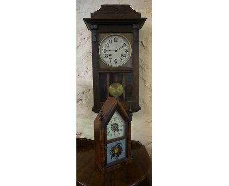 An American Wanut Cased Mantel Clock, 37cm high, also with a wall clock, (2) 