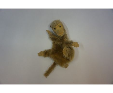 A Chad Valley Hand Puppet, circa 1930s, Modelled as a monkey, 31cm long