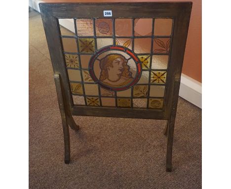 An Arts &amp; Crafts Style Oak Framed and Leaded Stained Glass Firescreen, circa early 20th century, Decorated with a panel o