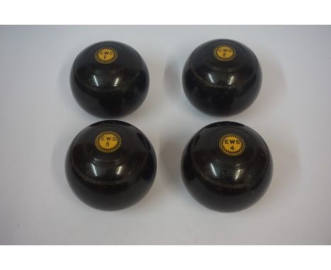 A Set of Four Vintage Bowling Balls, Having ivory mounts, stamped E.W.S, numbered 1 to 4, (4)