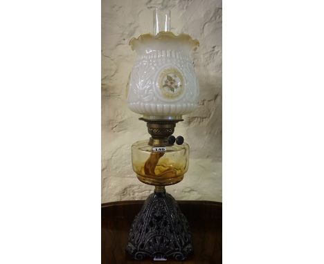 A Vintage Oil Lamp, Having a glass reservoir, funnel and frilly shade, 60cm high