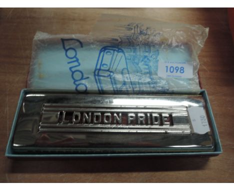 A vintage London Pride harmonica in original box, numbered 6029