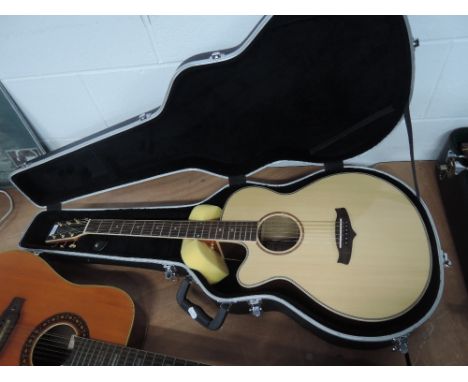A Tanglewood TRS-CE.LH Rosewood Reserve electro acoustic guitar with Stagg Hard case