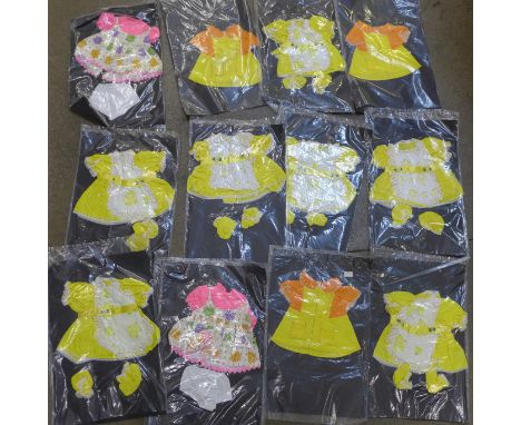 Twenty-seven vintage doll clothes sets 