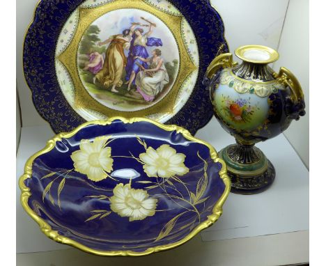 A Rosenthal royal blue and gilt shallow dish, decorated with flowers, a Karlstad large cabinet plate and a Viennese vase, dec