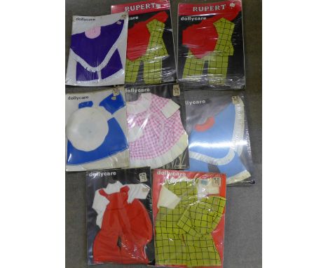 Eight vintage Dollycare branded costumes including Rupert Bear 