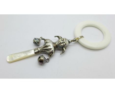 A hallmarked silver and mother of pearl jester rattle 