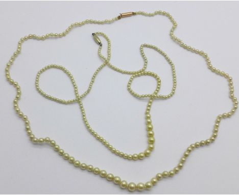 Two pearl necklaces with 9ct gold clasps 