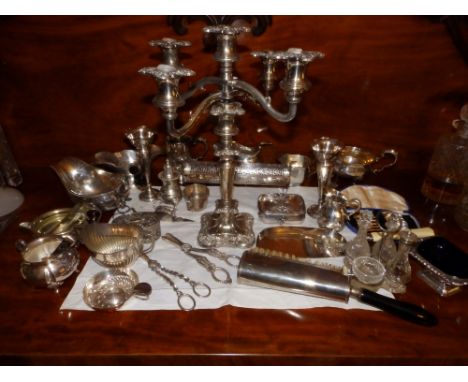 An EP five-light candelabra, two pairs of grape scissors and other items.  Separate viewing arrangements by appointment.  Din