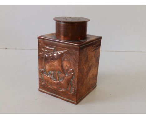 A square copper tea caddy by H. Dyer, Mousehole, embossed with a galleon to one side, 5" high.