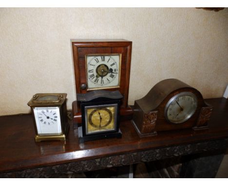 A brass carriage clock, 4.25" high excluding handle. A 19thC American alarm mantel clock and two others. (4)  Separate viewin