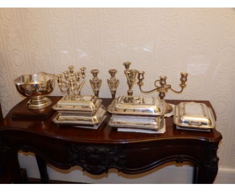 Five rectangular EP entrée dishes, one engraved 'Newton Abbot Fat Stock Show, Dec 3rd 1934', two pairs of EP candelabra, two 