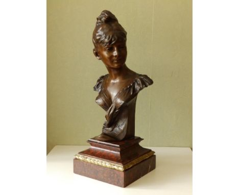 An art nouveau bronze bust of a young girl by Anton R. Nelson (1880-1910) - 'Moutime', signed &amp; inscribed 'Cie des Bronze