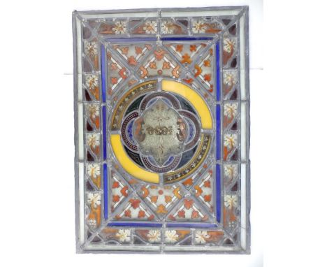 An early Victorian stained glass leaded light window panel, dated 1838 to central quatrefoil within a grape vine border, 24" 