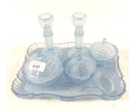 An Art Deco blue glass trinket set
