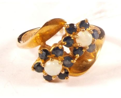 A 9ct gold opal and sapphire double cluster ring, size N