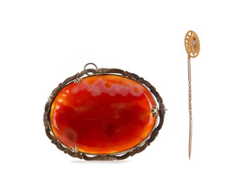 AGATE BROOCH,of oval form, to a gold plated mount, along with an unmarked diamond stick pin (2)