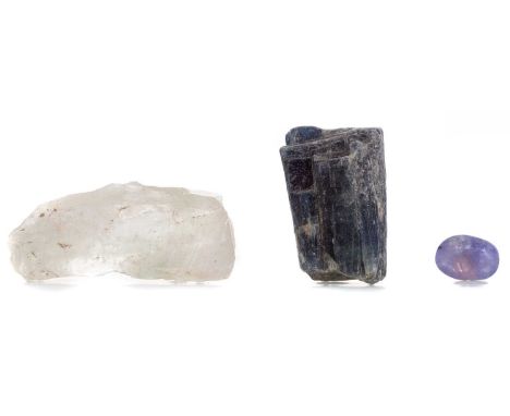 **THREE UNMOUNTED CERTIFICATED GEMSTONES,including a 143.20 carat rough green amethyst, 185.55 carat rough kyanite and a 9.10