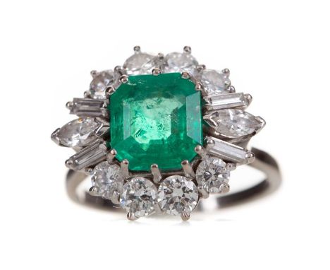 EMERALD AND DIAMOND RING,the octagonal step cut emerald flanked by marquise and baguette cut diamonds, between round brillian