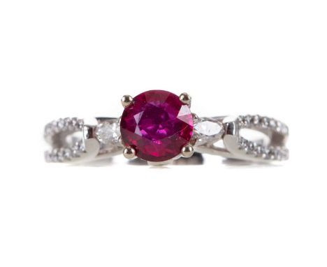 RUBY AND DIAMOND RING,set with central ruby of approximately 0.86 carats, flanked by marquise cut diamonds, on diamond set sp