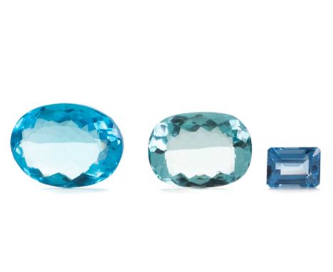 **THREE UNMOUNTED AQUAMARINES,including a 15.50 carat step cut, 40.35 carat oval cut and 80.10 carat oval cut (3)Condition re
