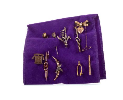 GROUP OF GOLD AND OTHER BROOCHES,including nine carat gold sapphire and seed pearl brooch, a nine carat gold wishbone, a gold