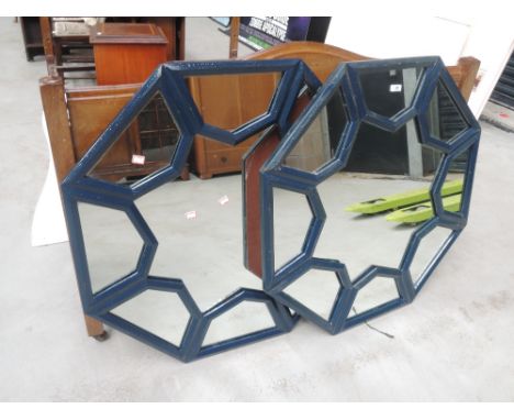 A pair of vintage painted mirrors