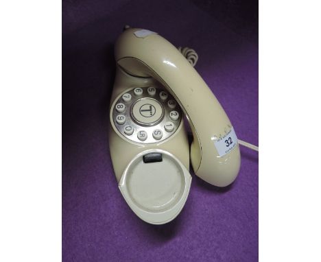 A vintage telephone the Genie in a retro design