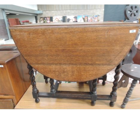 An early to mid 20th Century twist gate leg table