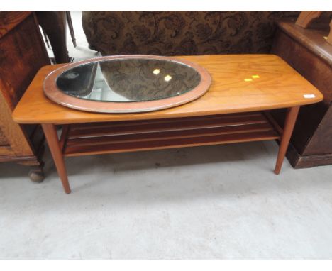 A vintage coffee table and wall mirror