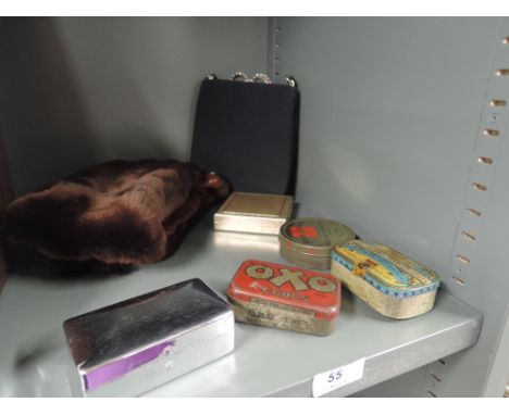 A selection of vintage advertising tins and cigarette case 