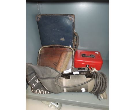 A vintage vacuum cleaner by Hoover Dustette