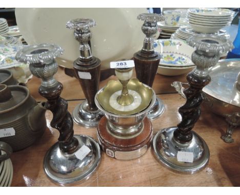 A selection of vintage treen and plated candle sticks