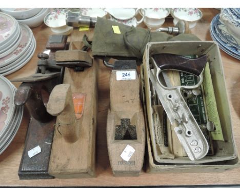 A selection of woodworking tools including Stanley multi plane and Marples block planes
