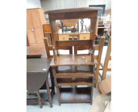 An oak occasional table and shelf