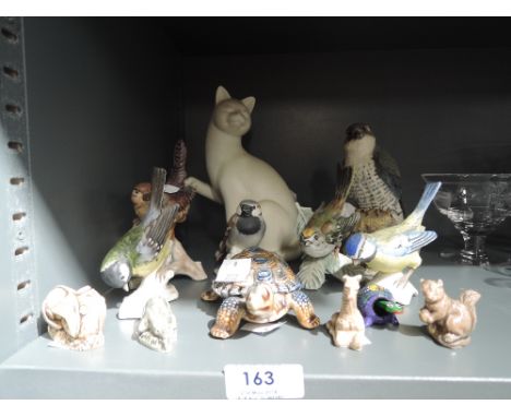 A selection of vintage figures and figurines including Goebel tits