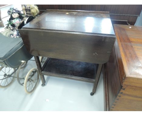 A vintage oak tea trolley