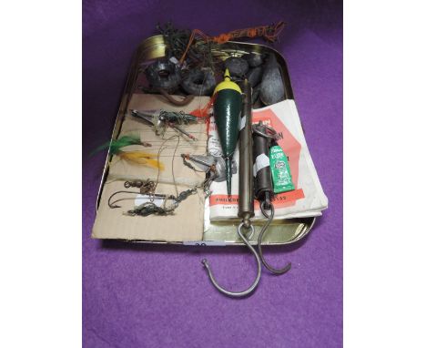 A selection of vintage fishing tackle and equipment