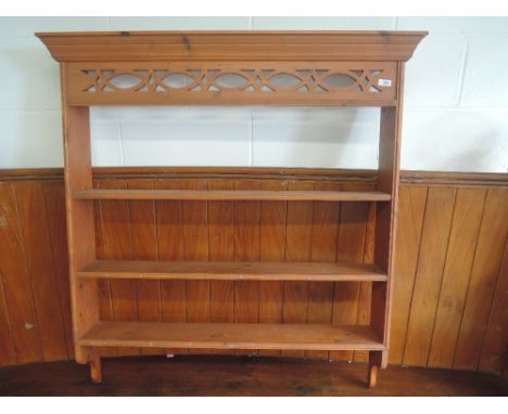 A stained frame wall shelf