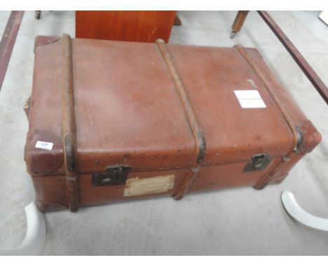 A vintage leather travel trunk