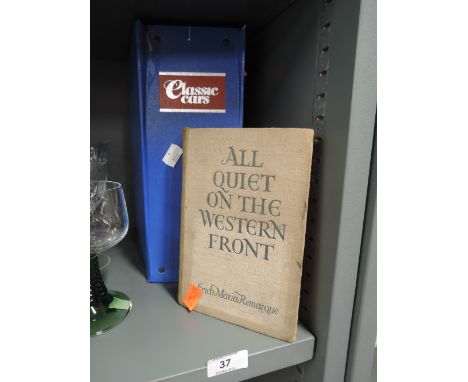 A vintage book volume of All quiet on the Western Front etc