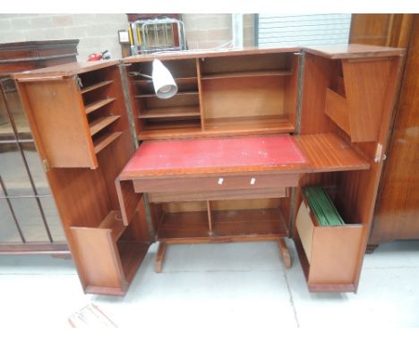 A vintage sapele fold out desk