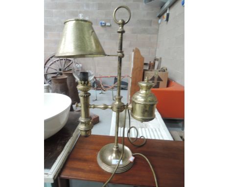 A brass gas style electric table lamp