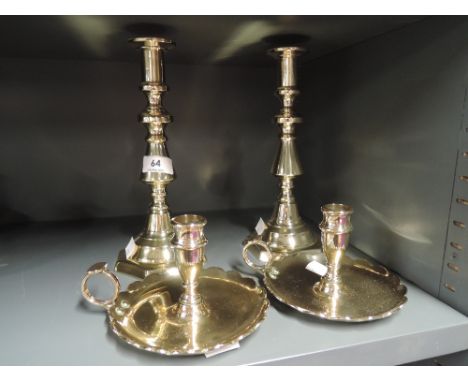 A selection of vintage chamber and candle sticks