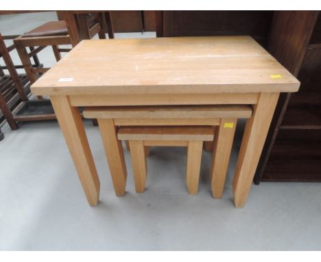 A modern light nest of three tables